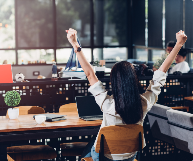 freelance-working-woman-with-laptop-computer-he-happy-raise-arms-job-success-coffee-shop 1-1